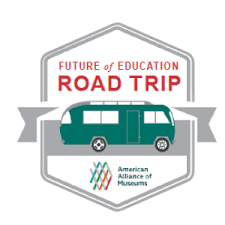 Future of Education Road Trip logo. Below the title is a cartoon of a green bus. Below this is the logo and name of the American Alliance of Museums. The outline of a gray hexagon encompasses the logo.