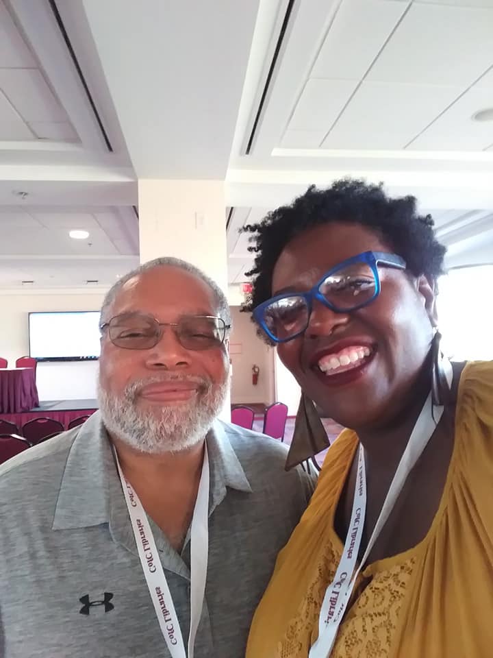 Photo of Dr. Moore and Dr. Lonnie Bunch next to each other, smiling at the viewer.  
